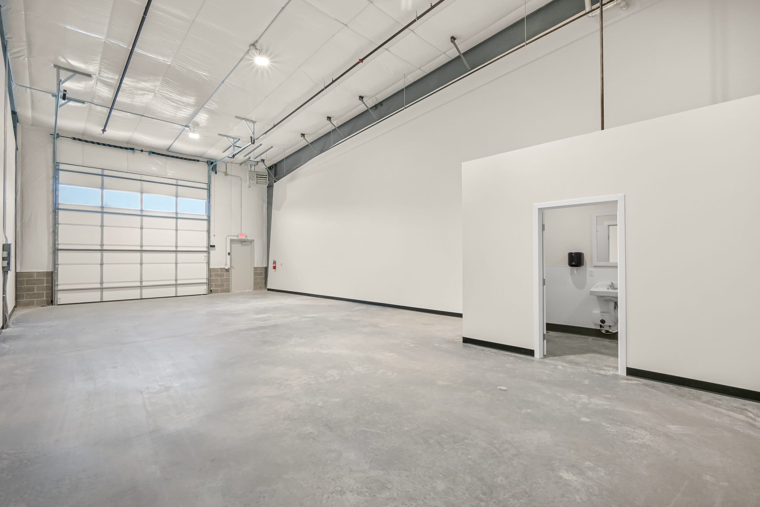 Insulated warehouse condo interior with natural gas heat and ADA bathroom — Bellingham, WA